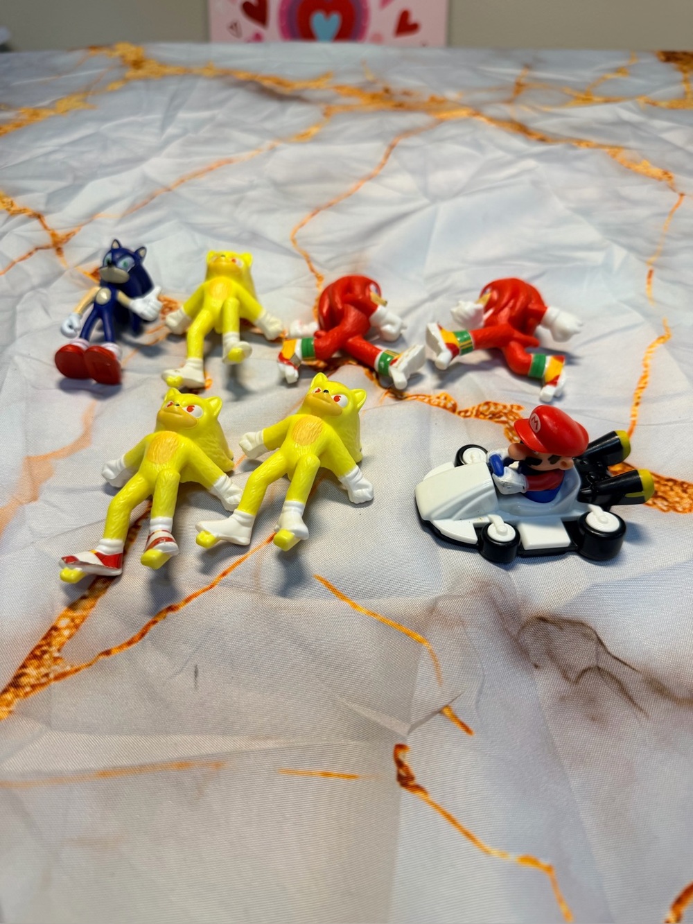Sonic the Hedgehog and Mario figurines